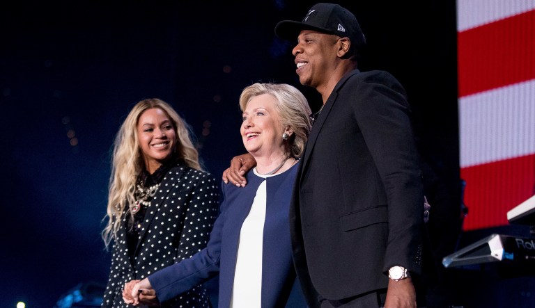 Hillary Clinton never misses an opportunity to namedrop in her new book. Readers will be reminded that she was a cool candidate, the kind who joked around with Kate McKinnon on SNL, who went on tour with Beyoncé and Jay-Z, and who has her very own Hollywood stylist. (AP Photo/Andrew Harnik, File)