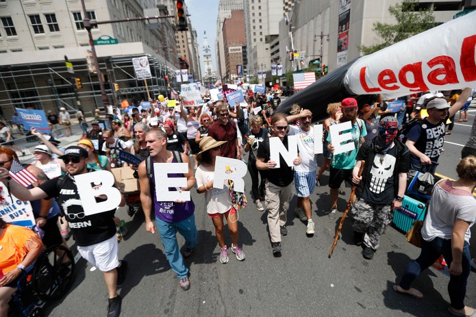 Bernie supporters chanted "We want Bernie!" after Sanders said in an address to hundreds of supporters Monday afternoon that he planned to support Hillary Clinton in an effort to defeat GOP nominee Donald Trump. (AP Photo/John Minchillo)