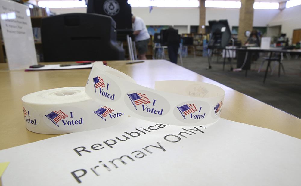 Beyond Georgia, Democrats eye voting reforms in several states