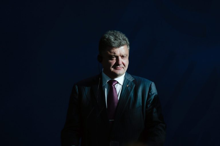 Ukraine president-elect Petro Poroshenko attends a joint news conference with German Chancellor Angela Merkel, prior to a meeting at the chancellery in Berlin, Thursday, June 5, 2014. (AP Photo/Markus Schreiber)