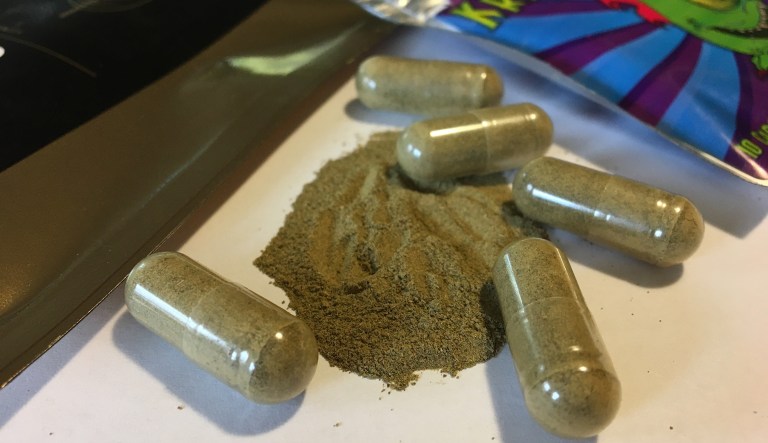 In this Sept. 27, 2017 photo, kratom capsules are displayed in Albany, N.Y. The Food and Drug Administration said in a notice Wednesday that manufacturers of supplements containing kratom should take their products off the market. (AP Photo/Mary Esch)