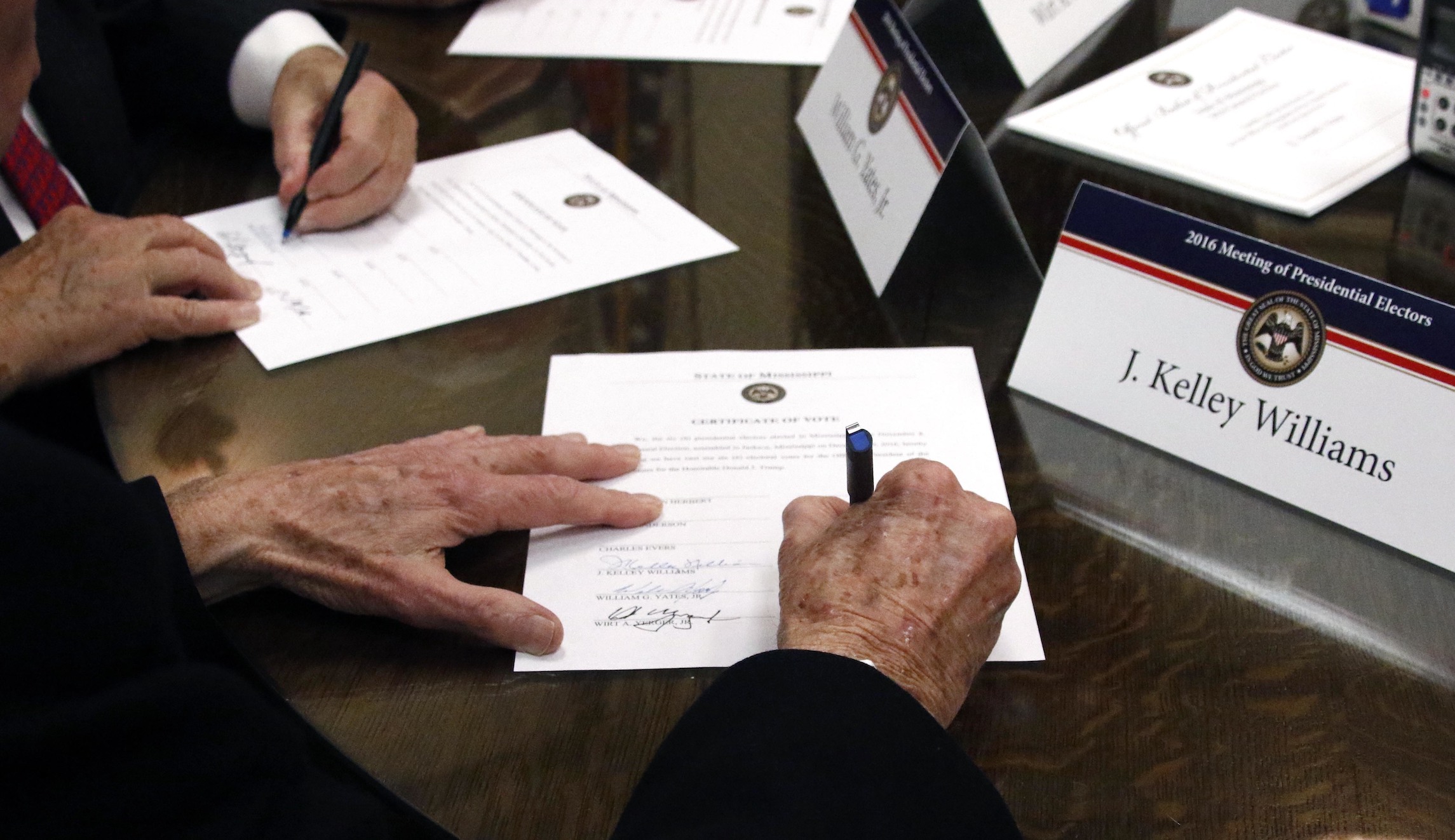 Electoral College gathers across country to elect Biden