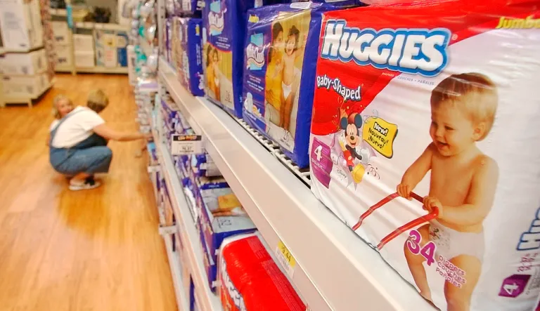 In this Aug. 24, 2004 file photo a shopper and her child look at diapers at a store in Little Rock, Ark.