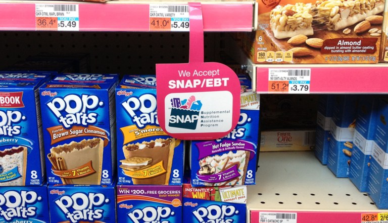 A convenience store in Washington, D.C., displays signage for the Supplemental Nutrition Assistance Program, commonly known as food stamps.