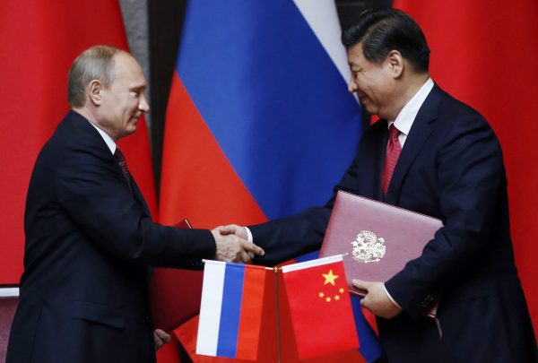 Putin backs China in war of words with US over coronavirus origins