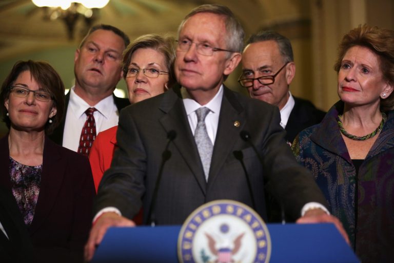 The DSCC raised a record $3.77 million in July. Sen. Elizabeth Warren, third from left, Senate Majority Leader Sen. Harry Reid, center, Sen. Charles Schumer, second from right, Sen. Debbie Stabenow, right, at the U.S. Capitol. (Alex Wong/Getty Images)