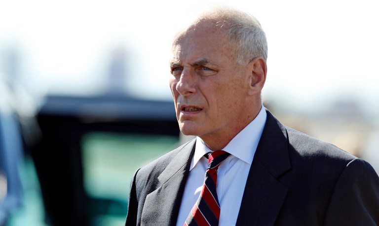 White House Chief of Staff John Kelly walks on the tarmac as he arrives Tuesday, Aug. 22, 2017, in Phoenix.