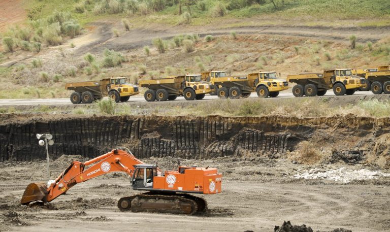 Machinery sits idle at the construction site of the Panama Canal expansion project in Gatun, Panama, Thursday, Feb.  20, 2014. The canal expansion project remained idle after the administrator of the Panama Canal said Wednesday that work would resume Thursday after it was halted over a disagreement with a contractor on cost overruns. (AP Photo/Arnulfo Franco)