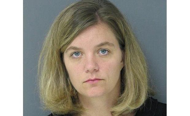 Woman pleads guilty to leaving son in hot van