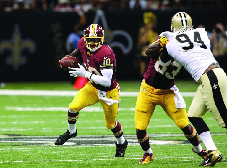 Matthew Hinton/AP
Washington Redskins quarterback Robert Griffin III was named NFC offensive player of the week on Wednesday.