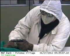 Suspect wields handgun, umbrella in Potomac bank robbery