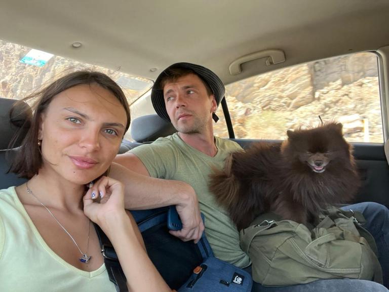A married couple from Russia travel by taxi to across the border from Yuma, AZ, where they planned to enter the United States from Mexico and seek refuge.