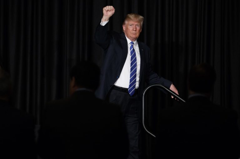 President Donald Trump gestures as he walks offstage after speaking to the Major County Sheriffs' Association and Major Cities Chiefs Association, Wednesday, Feb. 8, 2017, in Washington. (AP Photo/Evan Vucci)