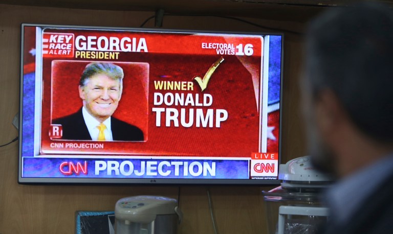 More than 71 million Americans tuned in watch election coverage on Tuesday night. (AP Photo/Rahmat Gul)