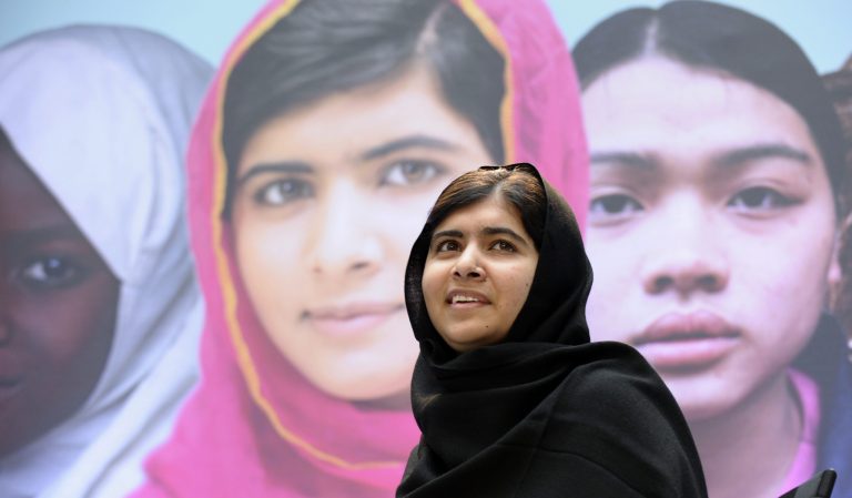 FILE - In this Oct. 11, 2013, file photo Malala Yousafzai, the 16-year-old girl from Pakistan, who was shot in the head by the Taliban last October for advocating education for girls, speaks on occasion of the International Day of the Girl at the World Bank in Washington. Malala has inspired the development of school curriculum encouraging advocacy. George Washington University announced Monday, Oct. 14, that faculty members are creating curriculum tools to accompany her book, 