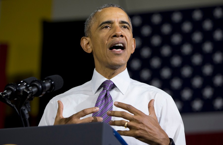 Obama cuts first check under climate deal