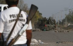 Soldiers flood western Mexico to protect towns