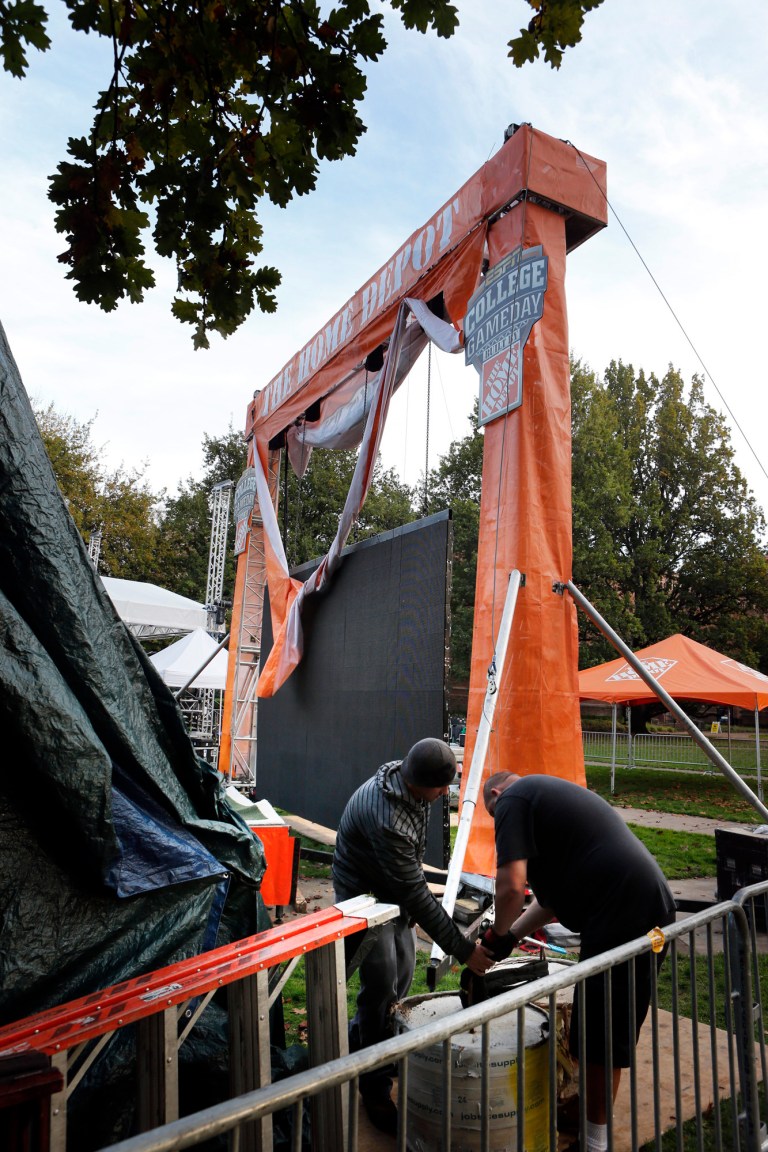 ESPN College Game Day crews set up Thursday Nov. 15, 2012 in Eugene, Ore.,  for Saturday morning's show on the Memorial Quad on the University of Oregon campus. Oregon hosts Stanford on Saturday in an NCAA college football game. (AP Photo/The Register-Guard, Chris Pietsch)