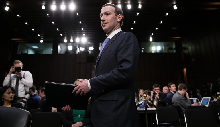 Facebook CEO Mark Zuckerberg testifies before a joint hearing of the Commerce and Judiciary Committees on Capitol Hill, Tuesday, April 10, 2018, about the use of Facebook data to target American voters in the 2016 presidential election.
