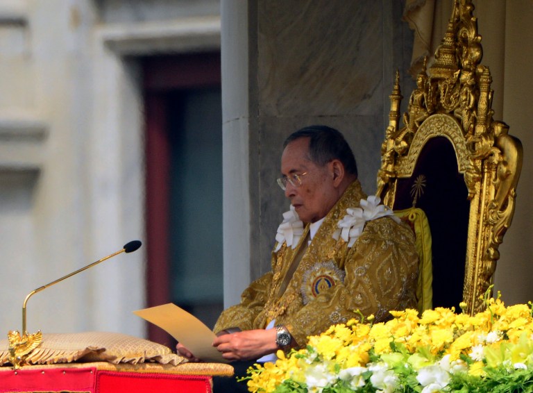   Thailand's King Bhumibol Adulyadej addresses to the crowd from the balcony at the Anantha Samakhom Throne Hall in Bangkok, Thailand, Wednesday, Dec. 5, 2012 during his 85th birthday celebration. (AP Photo/Sakchai Lalit)  