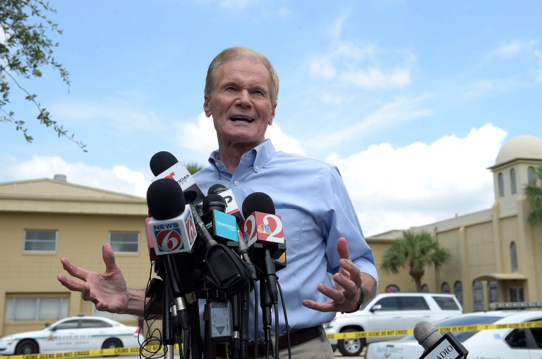 Sen. Bill Nelson, D-Fla., addresses reporters during a news conference after a shooting involving multiple fatalities at a nightclub in Orlando, Fla., Sunday, June 12, 2016. (AP Photo/Phelan M. Ebenhack)
