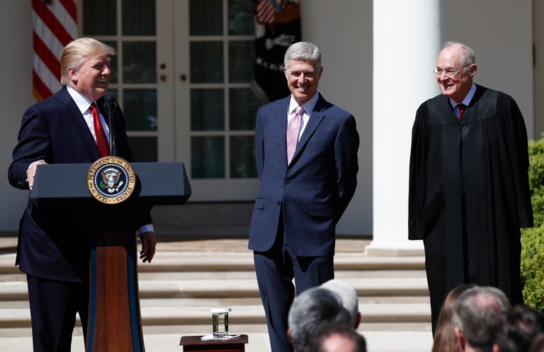 His praise of the judge was more than just a victory lap. It was part of an ongoing campaign to charm Justice Anthony Kennedy into retirement. (AP Photo/Carolyn Kaster)