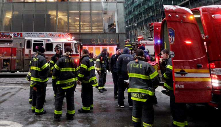 New York City Fire Department vehicles sit on Fifth Avenue in front of Trump Tower, in New York, Monday, Jan. 8, 2018.