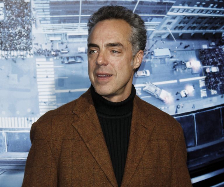 FILE - In this Jan. 23, 2012 file photo, cast member Titus Welliver arrives at the premiere of 