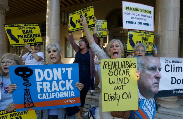 Hillary Clinton is a supporter of the fossil fuel industry and a defender of fracking. (AP Photo/Jeff Chiu, File)
