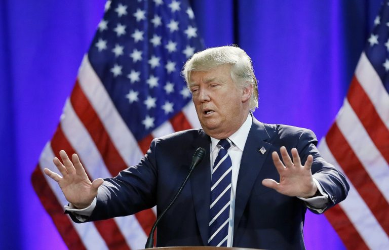 Republican presidential candidate Donald Trump addresses a GOP fundraising event, Tuesday, Aug 11, 2015, in Birch Run, Mich. Trump attended the Lincoln Day Dinner of the Genesee and Saginaw county Republican parties. (AP Photo/Carlos Osorio)