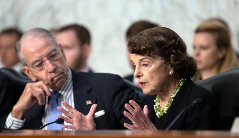 Senate Judiciary Committee Chairman Chuck Grassley, R-Iowa, left, listens to a procedural question from Sen. Dianne Feinstein, D-Calif., the ranking member, as President Donald Trump's Supreme Court nominee, Brett Kavanaugh, waits to testify before the Senate Judiciary Committee for the third day of his confirmation hearing, on Capitol Hill in Washington, Thursday, Sept. 6, 2018.