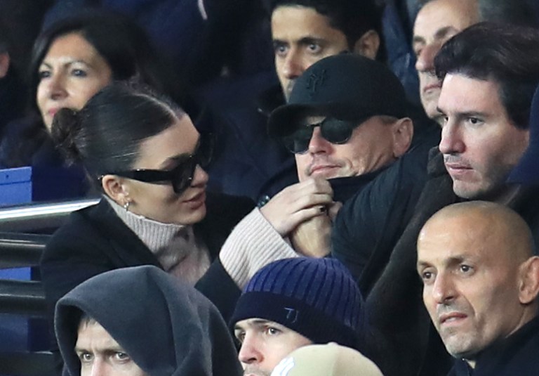 Leonardo DiCaprio and girlfriend Cami Morrone in the stands during the UEFA Champions League, Group C match at the Parc des Princes, Paris. 