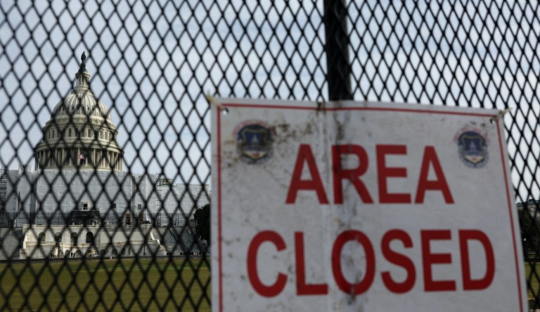 A security fence surrounds the U.S. Capitol on Feb. 5, 2023, in Washington, D.C. The fence is being installed as part of enhanced security measures ahead of President Joe Biden's State of the Union address on Tuesday. 