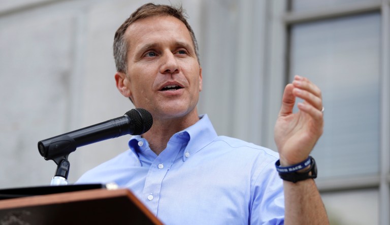 Missouri Gov. Eric Greitens speaks to supporters during a rally Tuesday, May 23, 2017, outside the state Capitol in Jefferson City, Mo. Greitens has brought lawmakers back to for a special session to consider legislation that would allow steel-works facilities and aluminum smelters to negotiate electricity rates lower than what is allowed under current law and for longer contracts which supporters say would create jobs while critics call the push a veiled attempt to make it easier for investor-owned utilities companies to raise rates. 