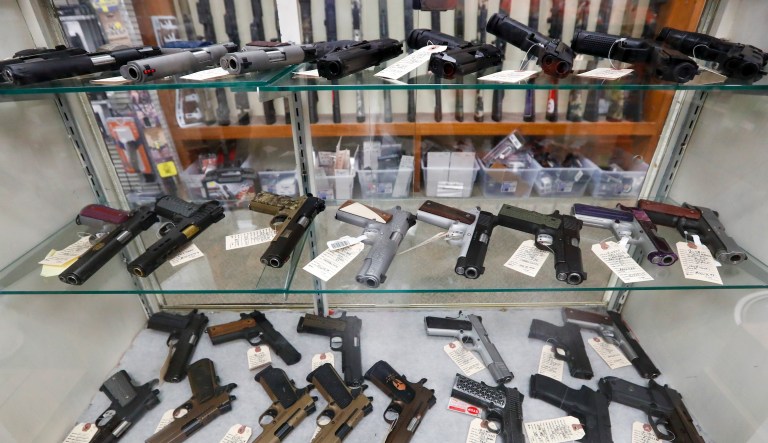 Semi-automatic handguns are displayed at Duke's Sport Shop, Wednesday, March 25, 2020, in New Castle, Pennsylvania.