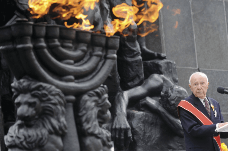 FILE - In this Friday, April 19, 2013, file photo, Simcha Rotem, the last known remaining Jewish fighter from the 1943 Warsaw ghetto uprising against the Nazis, speaks in front of the Warsaw Ghetto Uprising memorial during the revolt anniversary ceremonies in Warsaw, Poland. Rotem has died on Sunday, Dec. 23, 2018. He was 94.