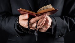 Catholic university students corner priest for opposing pride flag