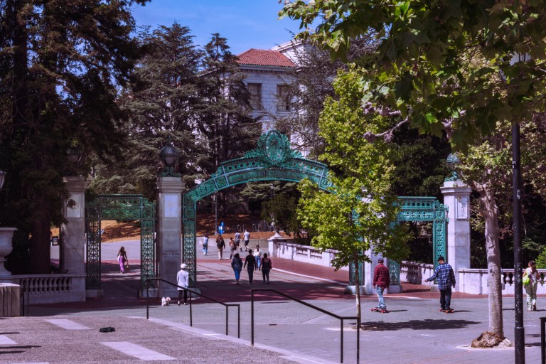 Students walk past Sather Gate on Thursday, May 10, 2018, on the University of California at Berkeley campus in Berkeley, Calif. 