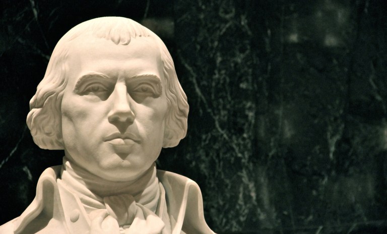 A portrait of President James Madison by Gilbert Stuart is shown.
