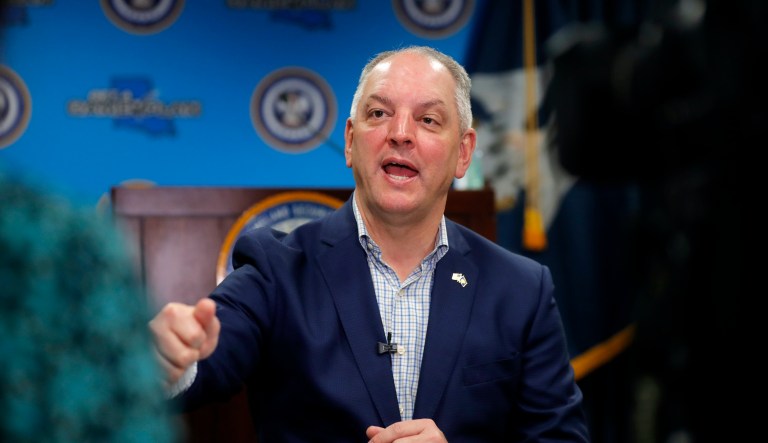 Louisiana Gov. John Bel Edwards speaks during an interview with the Associated Press, inside the Louisiana Office of Homeland Security and Emergency Preparedness in Baton Rouge, Friday, April 3, 2020.