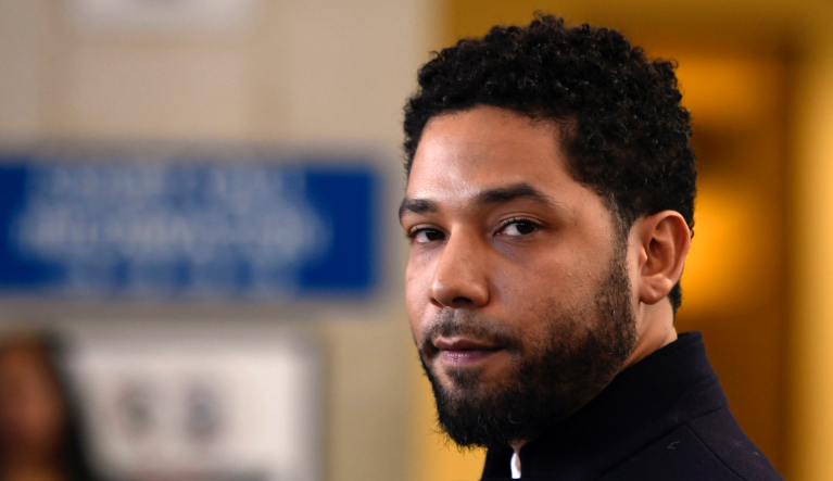 FILE - In this March 26, 2019, file photo, actor Jussie Smollett talks to the media before leaving Cook County Court after his charges were dropped, in Chicago. The latest twist in the Jussie Smollett saga is the revelation of a possible conflict of interest by the special prosecutor investigating why prosecutors dropped charges accusing the actor of staging a racist, homophobic attack on himself. Dan Webb disclosed this week he once co-hosted a political fundraiser for a figure central to his investigation, Cook County State's Attorney Kim Foxx. A Cook County judge must now decide if bias or the appearance of bias renders Webb's position untenable. (AP Photo/Paul Beaty, File)