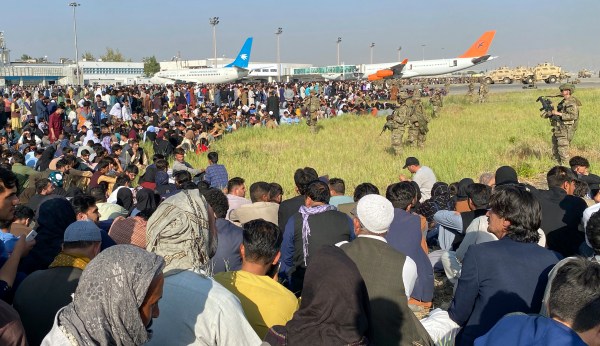 Families trying to escape Kabul fearful of trying to get to airport