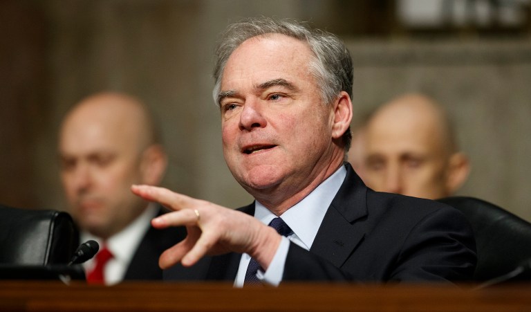 U.S. Sen. Tim Kaine, D-Va., gestures during a speech at a campaign kickoff rally in Richmond, Va., Monday, April 2, 2018.