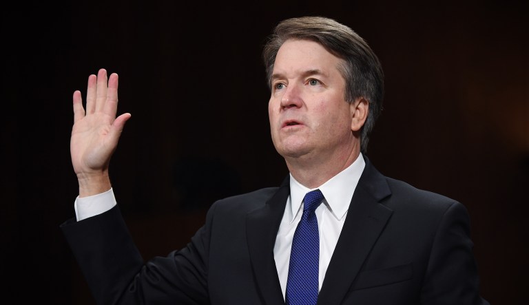 Brett Kavanaugh, U.S. Supreme Court associate justice nominee for U.S. President Donald Trump, is sworn in during a Senate Judiciary Committee hearing in Washington, D.C., U.S., on Thursday, Sept. 27, 2018. Christine Blasey Ford said she is "one hundred percent" certain that KavanaughÂ is the person who sexually assaulted her when they were teenagers, and she told a Senate committee that he and his friend laughed at her expense during the attack.