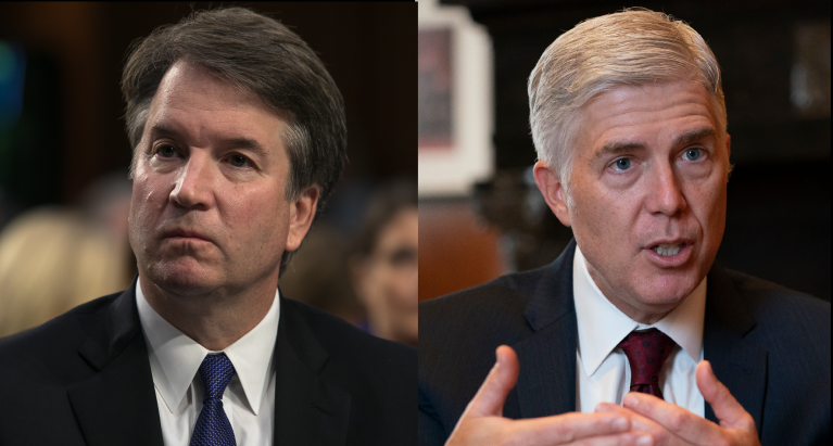 Supreme Court Justices Brett Kavanaugh (left) and Neil Gorsuch (right) are seen.
