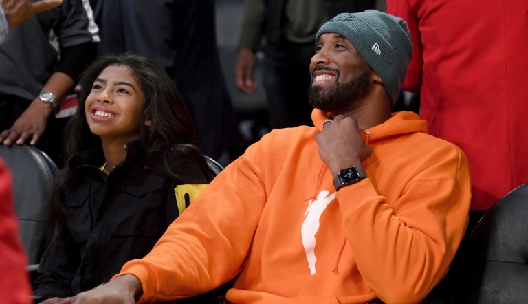 Former Los Angeles Laker Kobe Bryant and his daughter Gianna Bryant attend an NBA basketball game between the Los Angeles Lakers and Dallas Mavericks Sunday, Dec. 29, 2019, in Los Angeles.