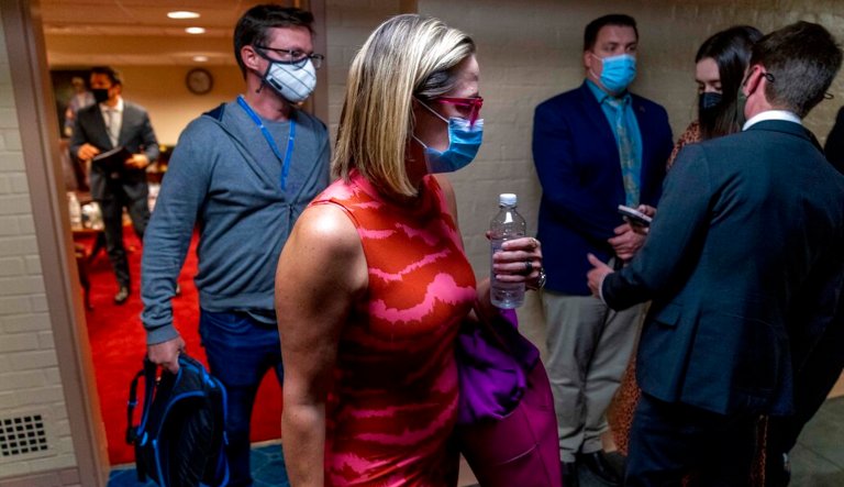 Sen. Kyrsten Sinema, D-Ariz., ask questions of the panel during a Senate Homeland Security and Governmental Affairs committee on conditions at the Southern border, Tuesday, July 30, 2019, on Capitol Hill in Washington.