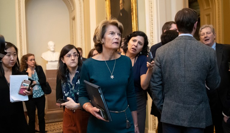 Senate Energy and Natural Resources Committee Chair Sen. Lisa Murkowski, R-Alaska, arrives at a Senate Republican luncheon at the Capitol in Washington, Tuesday, Nov. 27, 2018. Today, her panel approved controversial nominee Bernard McNamee to join the Federal Energy Regulatory Commission, the agency that oversees U.S. electricity markets.