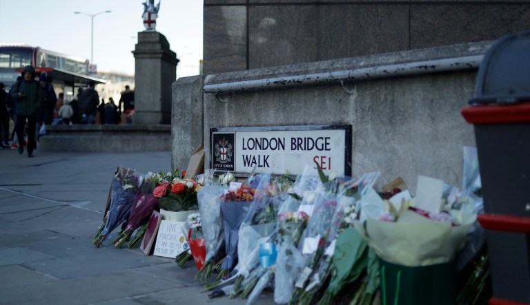 Police on Cannon Street in London near the scene of an incident on London Bridge in central London following a police incident, Friday, Nov. 29, 2019.