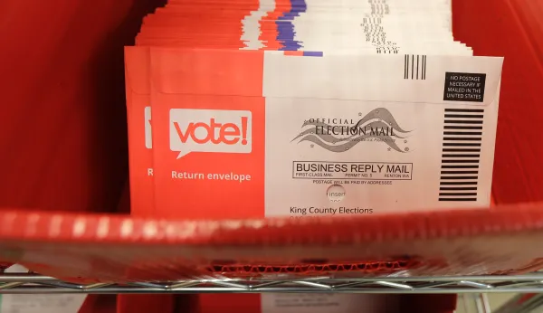 Biden votes in person for Delaware primary